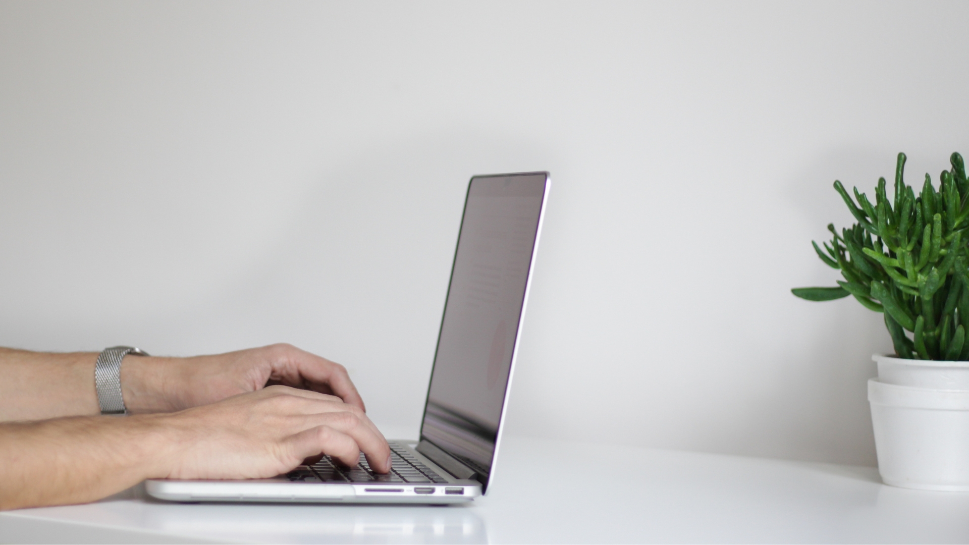 Laptop on a desk showing digital training solutions in progress